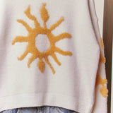 Cozy Knit Sweater with Bold Yellow Sun Patch