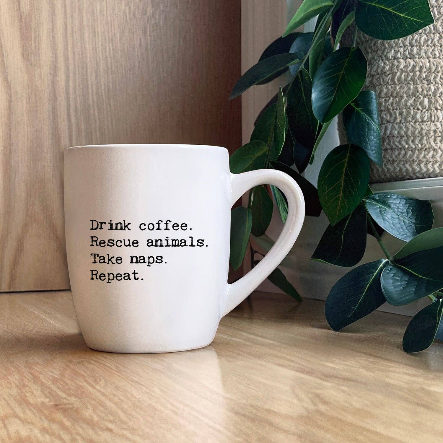 "Drink coffee. Rescue animals." Ceramic Mug