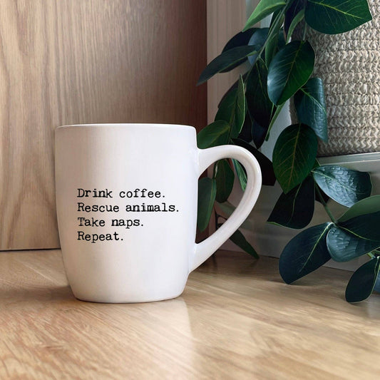 "Drink coffee. Rescue animals." Ceramic Mug