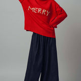 Textured "Merry" Graphic Boxy Turtleneck