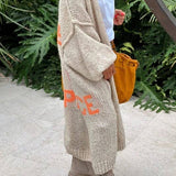 "Love & Peace" Exposed Seam Knit Cardigan